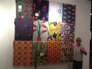 Betsy Quick explains the history of printed Ghanaian fabrics at the Fowler Museum (Vanessa Okoth-Obbo/Neon Tommy)