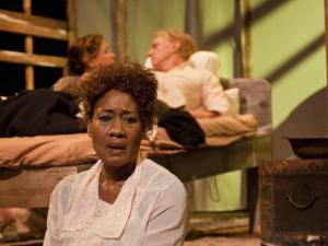 Julia (Veralyn Jones) reflects on the implications of her taboo romance. (Geoffrey Wade Photography)