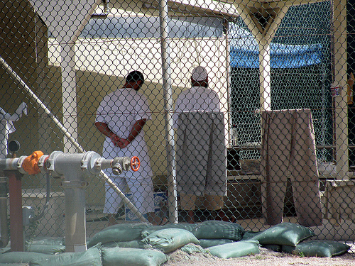 Detainees at Guantanamo Bay (Courtesy Creative Commons) Detainees at Guantanamo Bay (Courtesy Creative Commons)