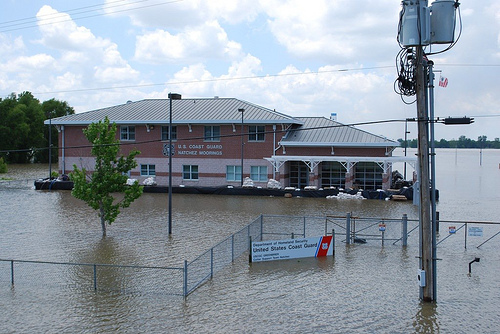 A U.S. Coast Guard Station surrounded by flood waters in Natchez, Miss. (Photo from Creative Commons via the U.S. Army Corps of Engineers) A U.S. Coast Guard Station surrounded by flood waters in Natchez, Miss. (Photo from Creative Commons via the U.S. Army Corps of Engineers)