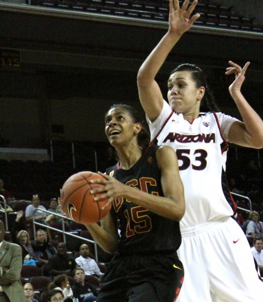 Arizona's Soana Lucet prepares to block Briana Gilbreath's shot from behind. (Shotgun Spratling