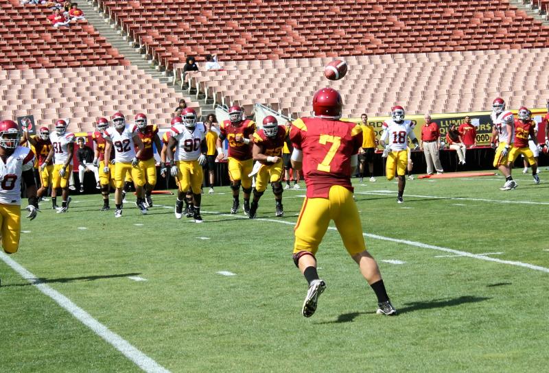 Matt Barkley catches a pass from running back Dillon Baxter on the final play of the USC Spring Game. (Shotgun Spratling)