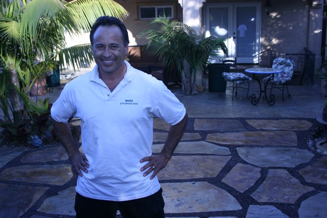 Mike Garcia, owner of Enviroscape L.A., stands on top of his rain harvesting system. (Andrew Khouri) Mike Garcia, owner of Enviroscape L.A., stands on top of his rain harvesting system. (Andrew Khouri)
