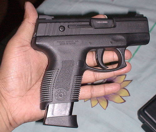 High-Capacity Magazine on Hand Gun (Courtesy Creative Commons)