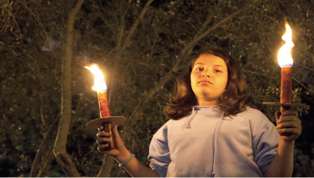 Palestinian girl protests in Nazareth. Photo by Sharis Delgadillo.