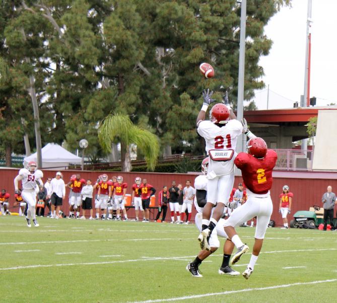 Nickell Robey pulls down a Max Wittek pass for an interception. (Shotgun Spratling)