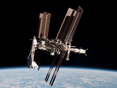 The International Space Station and docked orbiter Endeavour. Image taken by Expedition 27 astronaut Paolo Nespoli on the Soyuz TMA-20 following its undocking on May 23, 2011, USA time. The International Space Station and docked orbiter Endeavour. Image taken by Expedition 27 astronaut Paolo Nespoli on the Soyuz TMA-20 following its undocking on May 23, 2011, USA time.