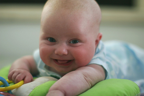 Babies smile at everyone, including people they don't know. Why can't we? (Bryan Allison, Creative Commons)