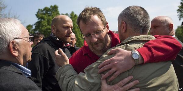 OSCE are reunited with friends and family (twitpic|@BBCWorld) 