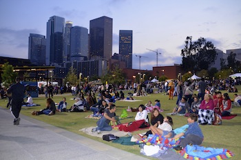 Atendees relaxing in Grand Park during the evening festivities, Sara Newman