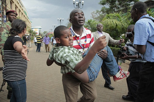 ( A man and a boy flee the sites of Nairobi's Westgate shopping mall / DurdurNews via Creative Commons)