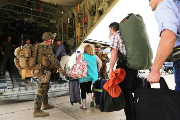 U.S. Marines evacuate embassy personnel/via U.S. Marines