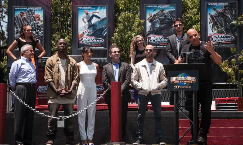 The cast kicking off the ride (Courtesy of Universal)
