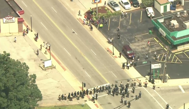 Ferguson police march on protestors after night of civil unrest. (Screencap/KSDK 5) Ferguson police march on protestors after night of civil unrest. (Screencap/KSDK 5)