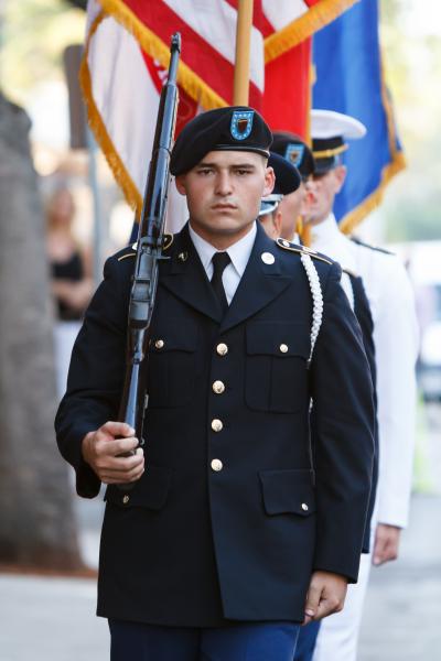 The USC ROTC Color Guard performs the Presentation of Colors during a 9/11 memorial installation ceremony. (Benjamin Dunn/Neon Tommy)