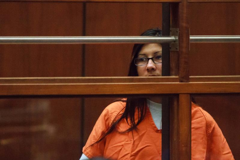 Alejandra Guerrero, charged with killing USC graduate student Xinran Ji, looks on as Judge Renee Korn discusses preliminary hearing procedures on 12/12/14 (Benjamin Dunn/Neon Tommy).