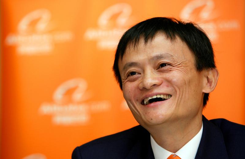 Jack Ma, CEO of Alibaba Group Holding Ltd., laughs at a news conference in Hong Kong, China. (Daniel J. Groshong/Bloomberg via Getty Images)