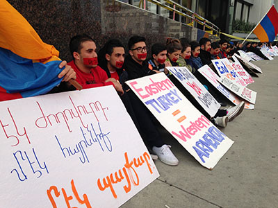Silent protest outside the Turkish Consulate on the 99th Anniversary of the Armenian Genocide (Ani Ucar//Neon Tommy)