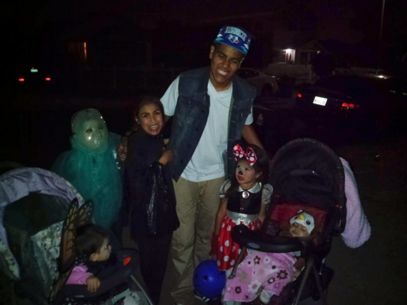 Andrew with his nieces on Halloween. Courtesy of Rosalie Garcia.