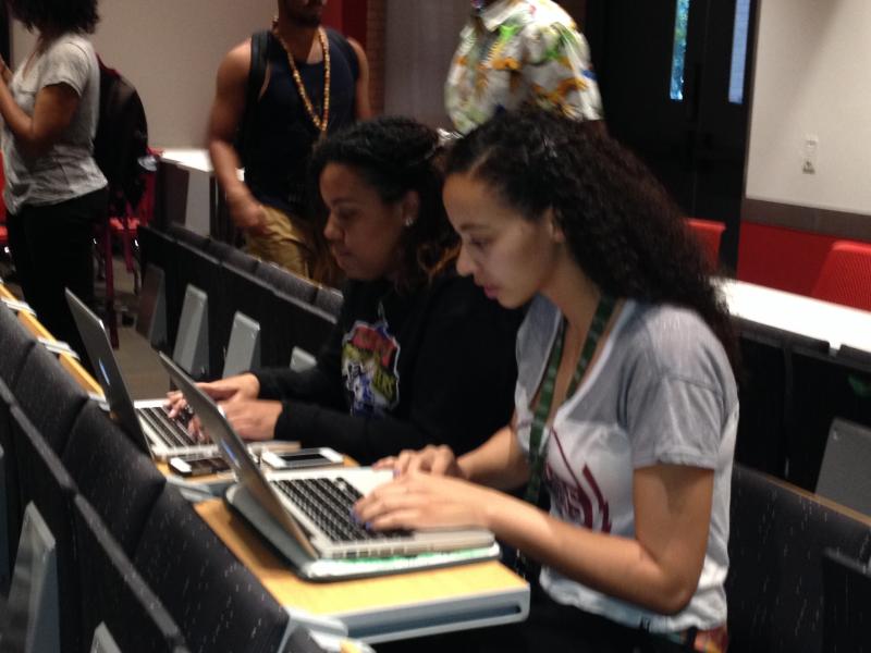  Koryn Frye-Fuentes and Alec Tiffany help out during a BSA meeting about Lorenzo, Monday evening. ( Neon Tommy/ Celeste Alvarez)