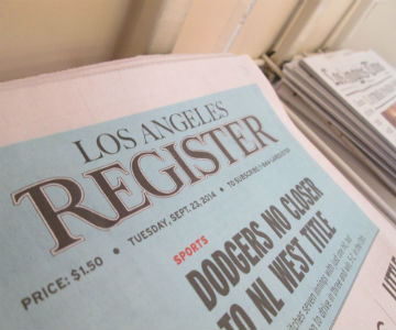 The final edition of the L.A. Register awaits purchase on newsstands Downtown. (Celeste Alvarez/ Neon Tommy)