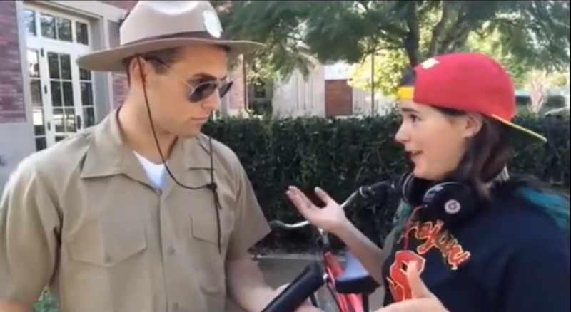 Tristan de Burgh speaks to another student about the “USC Booty Bandit” in his satirical video.