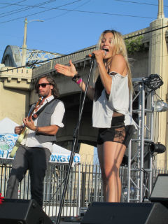 Zibbz lead singer Coco Gfeller rocks out on the cARTel stage during the 2014 Brokechella festival. (Celeste Alvarez/Neon Tommy)