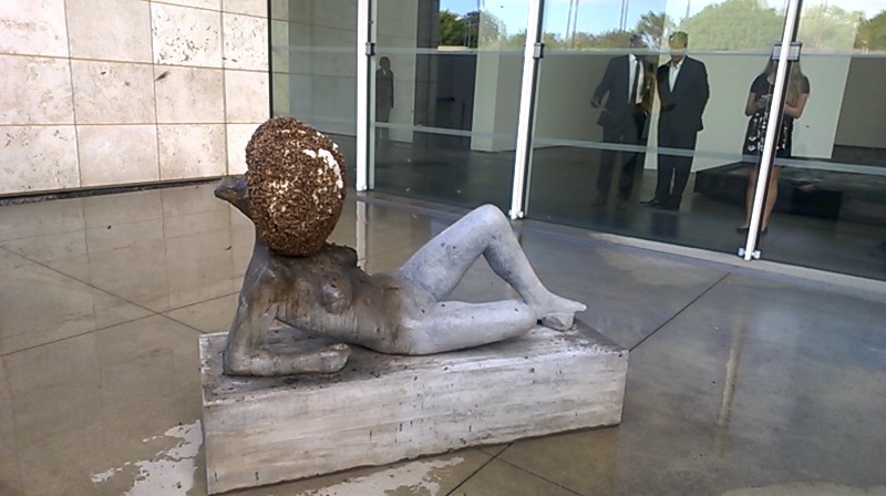 Bees cover this statue in Pierre Huyghe's LACMA installation. Photo by Vanessa Wilson. Bees cover this statue in Pierre Huyghe's LACMA installation. Photo by Vanessa Wilson.