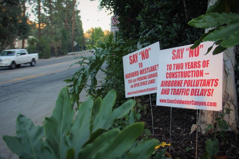 Some signs across Harvard-Westlake on Coldwater Canyon. (Cameron Quon/neontommy)