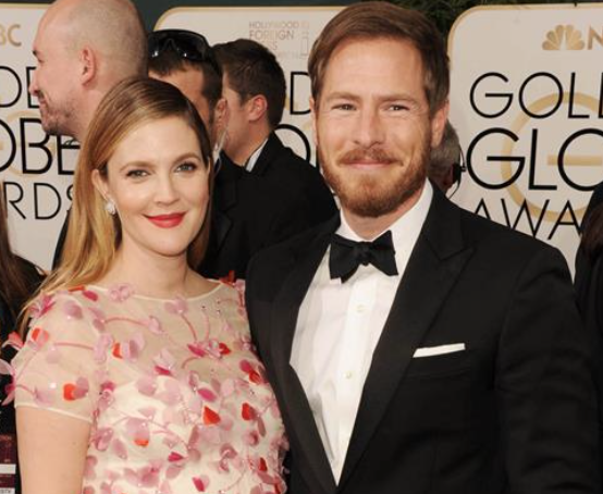 Drew Barrymore and Will Kopelman are proud parents (@OnTheRedCarpet/Twitter).