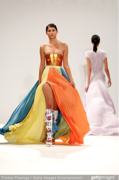 Bright, color-blocked gown at Ong Oaj Pairam (Getty Images).