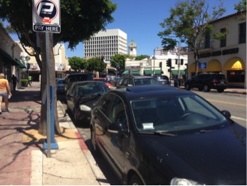Crowded meter parking on Broxton Ave. (Janin / Neon Tommy)
