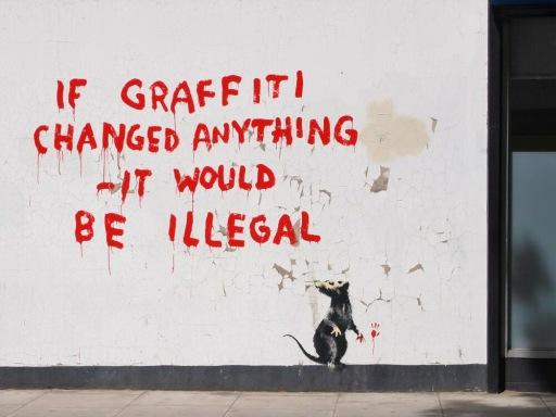 Famous street artist Banksy is known for his thought-provoking graffiti all over the U.S. and Europe (Twitter/@fqxjv)