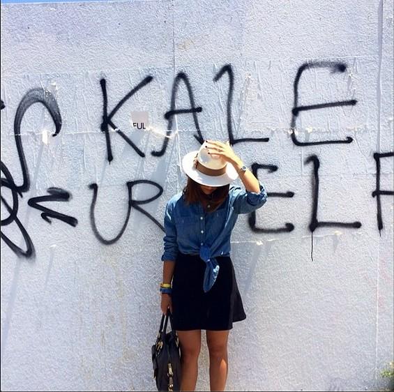 Street artist Carlos Herrera now sells shirts with his L.A.-centric graffiti "Kale Urself"(Twitter/@sarafenske). Street artist Carlos Herrera now sells shirts with his L.A.-centric graffiti "Kale Urself"(Twitter/@sarafenske).