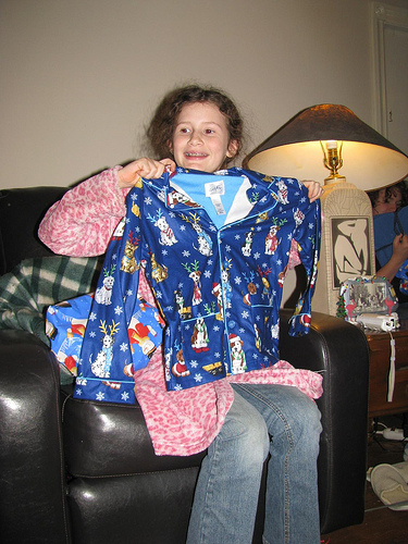 Unwrap a pair of holiday pajamas on Christmas Eve so that you look your best for present opening the next morning. (smiely/Flickr)