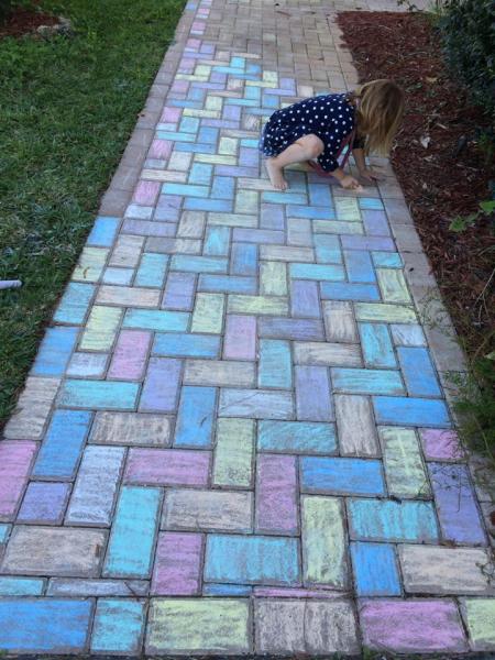 Yellow brick road no more. One young girl shows patience and planning in the coloring of this brick path (_yodacola_/Reddit).