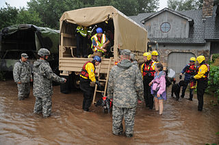 Colorado National Guardsmen respond to floods in Boulder County, Colorado, United States (Sgt. Joseph K. VonNida, Wikimedia Commons)