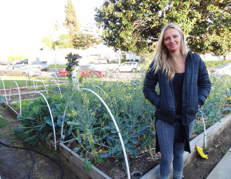 Courtney Guerra in front of her garden (Janelle Cabuco / Neon Tommy).