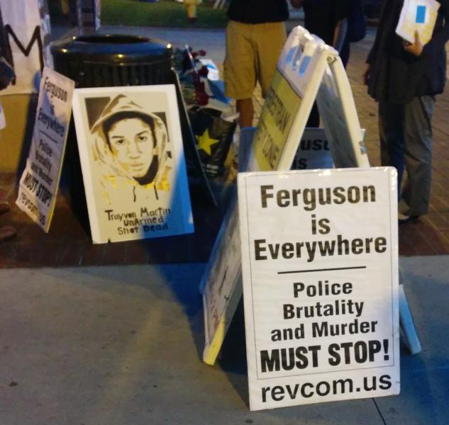 Posters put up by RCP supporter Keith James at the USC memorial for Mike Brown. (Sophia Li / Neon Tommy)