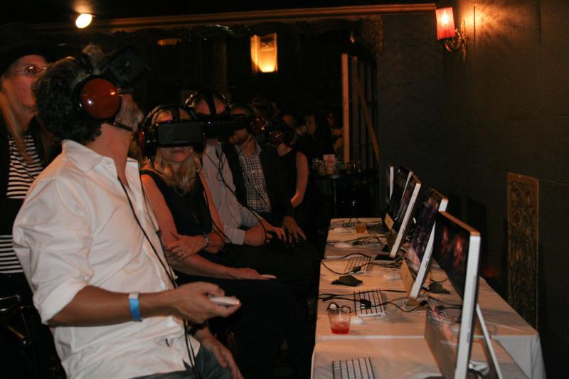 People experience Chris Milk and Beck's virtual reality concert. (Sophia Li)