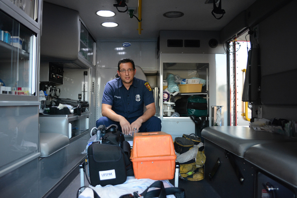 Firefighter-Paramedic Gary Izquierdo sits inside an ambulance at LAFD station 65 (Matthew Tinoco/Neon Tommy) Firefighter-Paramedic Gary Izquierdo sits inside an ambulance at LAFD station 65 (Matthew Tinoco/Neon Tommy)