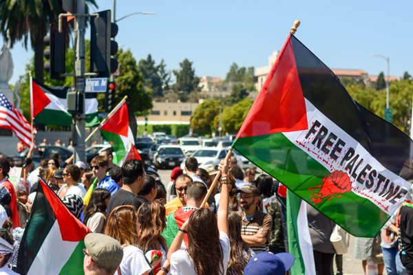 Flags and banners adorn the Palestinian side. (Matthew Tinoco/Neon Tommy) Flags and banners adorn the Palestinian side. (Matthew Tinoco/Neon Tommy)