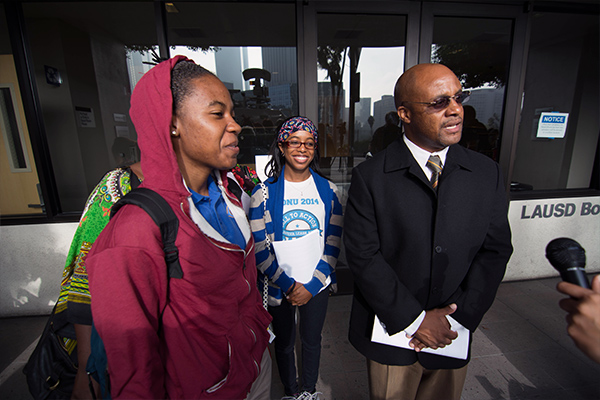 Simone Al-Alim and her father Kahllid speak to the press outside of LAUSD's Downtown Headquarters. (Matthew Tinoco/Neon Tommy) Simone Al-Alim and her father Kahllid speak to the press outside of LAUSD's Downtown Headquarters. (Matthew Tinoco/Neon Tommy)