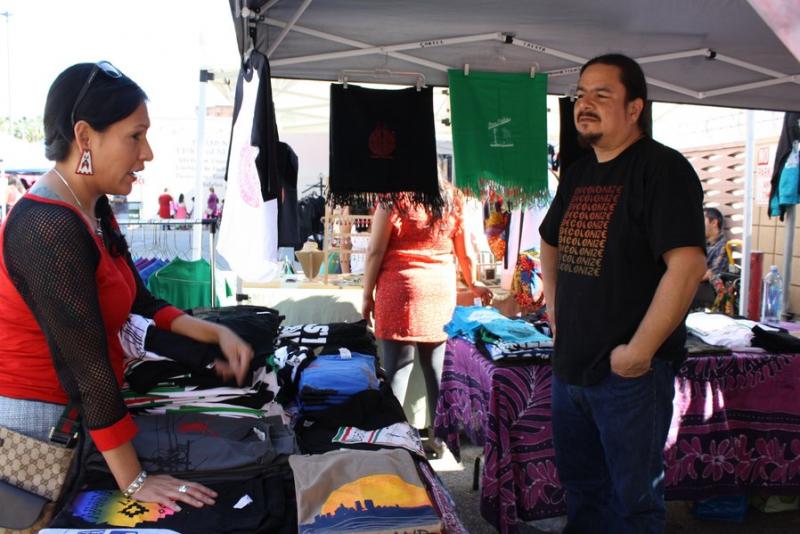 Dewey Tafoya, right, works with youth to inspire them to take part in the community. (Heidi Carreon/Neon Tommy)