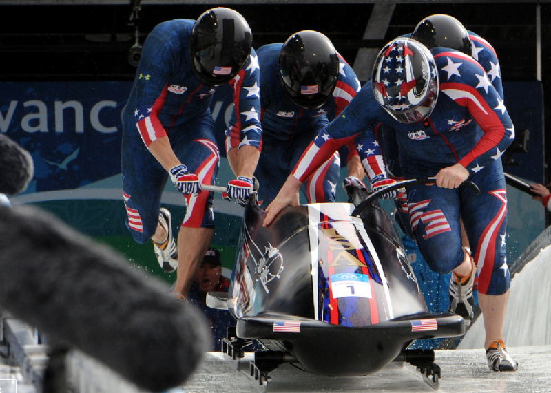 Steven Holcomb (front right) leads "The Night Train" team of Justin Olsen, Steve Mesler and Curtis Tomasevicz  (US Army/Flickr)