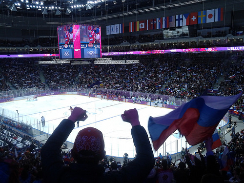 Russian flags wave in Bolshoy Ice Dome in Sochi (Atos / Flickr)