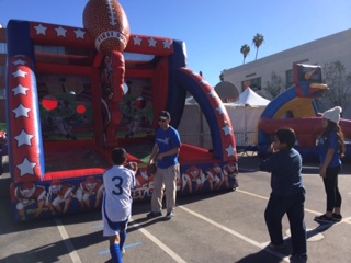 Participants battle it out in a game of inflatable basketball (Michelle Tak/Neon Tommy)