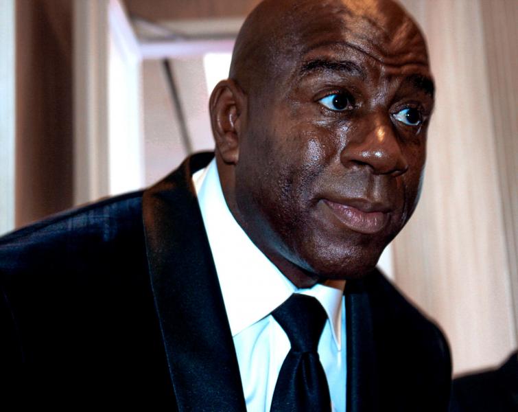 Earvin "Magic" Johnson is honored with the Brass Ring Award at the 2014 Carousel of Hope Ball. (Ashley Velez/Neon Tommy)