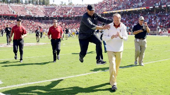 Steve Sarkisian and Pat Haden were giddy after USC's win Saturday. (Getty Images)
