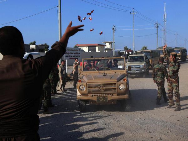Iraqi Kurds head off to help Syrian brethren against ISIS. (CBS News/Twitter) Iraqi Kurds head off to help Syrian brethren against ISIS. (CBS News/Twitter)